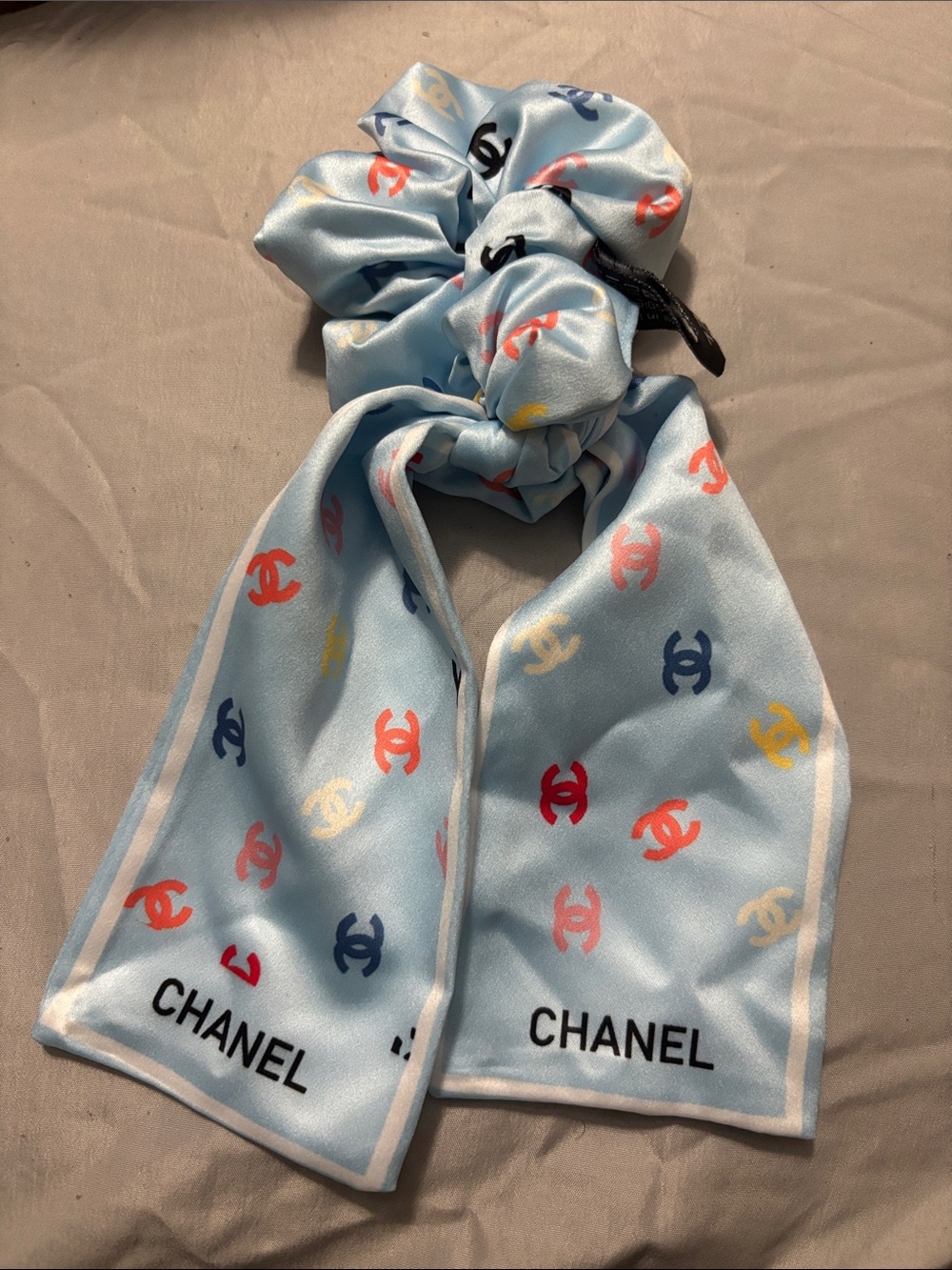 CHANEL Light Blue Kids Satin Scrunchie Scarf with Multicolor Logos